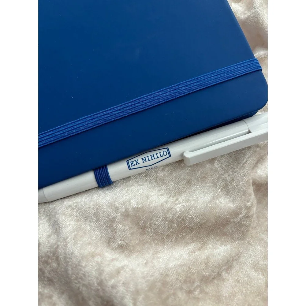 Ex nihilo brand notebook and pen